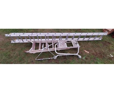 A set of extendable aluminium ladders with roof crawler and stand off attachments, together with a painter and decorators ste