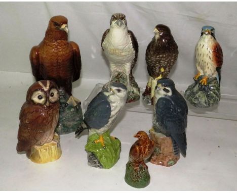  7 Royal Doulton and 1 Beswick whiskey birds, made for whyte and Mackaygood condition, 