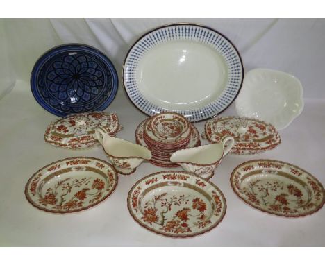 A part dinner service in the Indian Tree pattern, 2 tureens, 2 gravy boats, 3 open serving dishes, 8x 8 3/4" plates, 8 x 6 3/