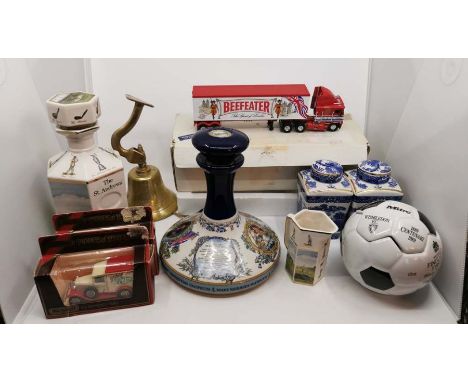 A quantity of miscellaneous items to include; Wade decanters, one in the form of a mitre football, my first computer, golfing