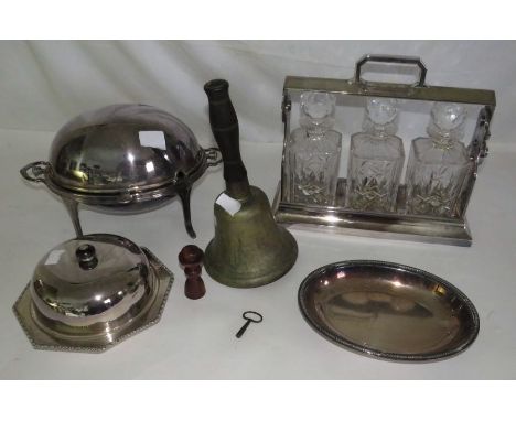 A collection of mixed silver plate, to include a Tantalus with 3 crystal glass decanters ( no key)muffin dish, a food warmer,