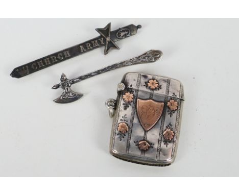 A George V silver vesta with yellow metal heraldic cartouche and floral accents, 16.34 gm, a hallmarked silver pin brooch in 