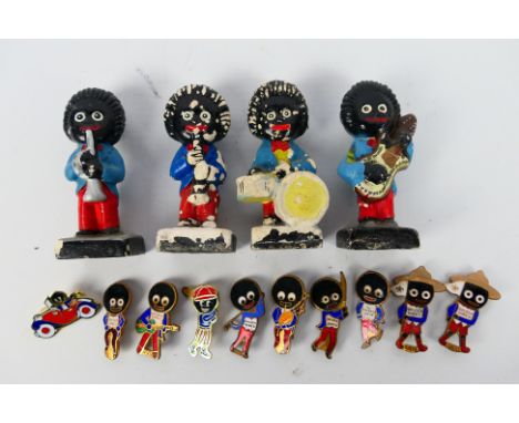 A collection of Robertson's vintage advertising figures and enamel badges. [W]These items are listed on the basis they are il