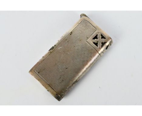 A vintage Dunhill Unity cigarette lighter with engine turned decoration, stamped Sterling Silver, 6 cm. [W]