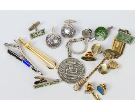 A small collection of gentleman's good quality jewellery comprising tie pins, tieclips, cufflinks, a high school silver badge