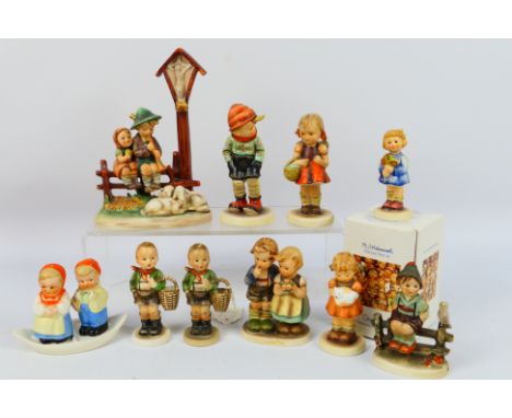 Goebel - A collection of Hummel figures / groups to include Wayside Devotion, Wayside Harmony, School Girl, March Winds and o