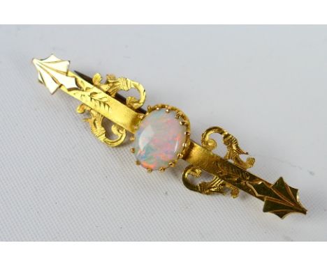 A 15 carat gold bar brooch set with opal, approx weight 2.16 gm (all in)