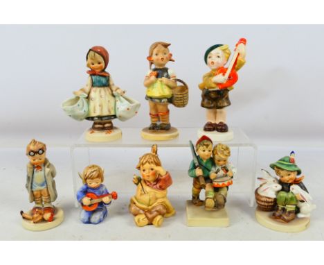 Goebel - A collection of Hummel and similar figures / groups, largest approximately 14 cm (h). [W]