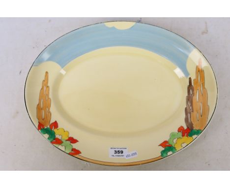 A Clarice Cliff oval plate for Wilkinson Ltd, decorated in the Capri pattern from the Bizarre collection, approximately 36.5 
