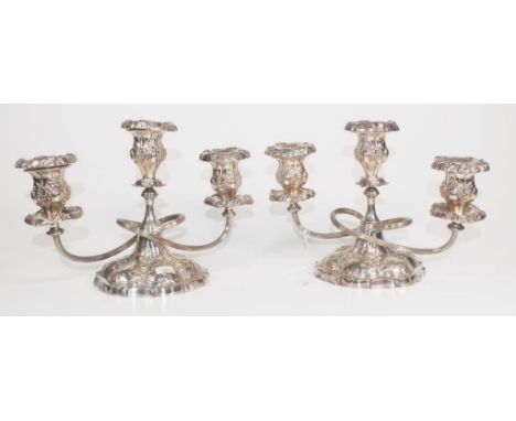 Pair vintage silver plate candelabra each with  3 branches, embossed decoration to sconces and bases. Sealed bases. (Height 1