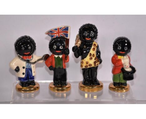 Four Carltonware golly wog figurines to include a doctor, magician, caveman, and a English union jack flag holder, height 10c