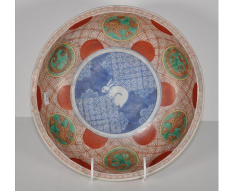 Vintage Japanese ceramic bowl blue and white rabbit decorated to centre, on hand painted iron red border. (Diameter 27.5cm, h