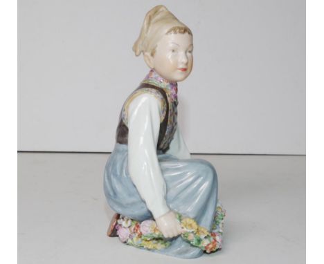 Vintage Royal Copenhagen Amager boy figurine in traditional dress, No.12414, 14.5cm high approx.Losses to flowers.