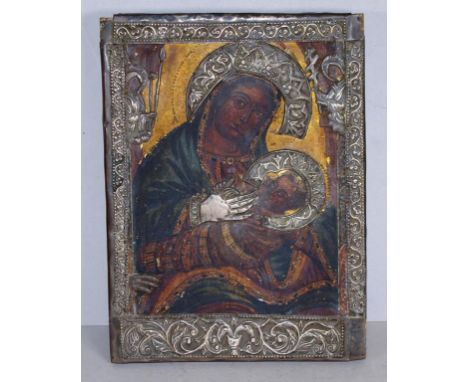 Good vintage Russian icon with silver oklad Madonna and Child, with silvered oklad, gesso on board. (33cm X 25cm approx).