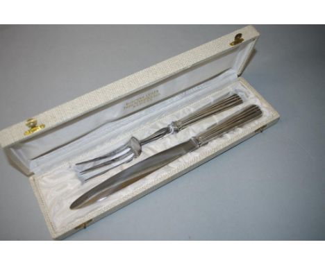 French silver art deco carving set 2 pieces, including knife and fork, marked Inox, in original fitted box.