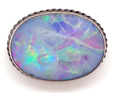 Large opal and silver brooch unmarked approx 34mm x 25.6mm flat cabochon size. A/F minor damage to one edge