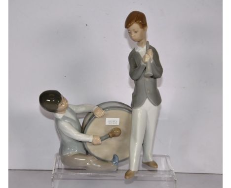 Lladro figural group of two boys playing musical instruments, height