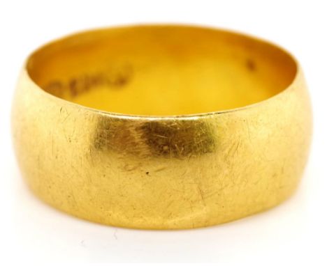 21ct Gold wedding band marked 21k and Arabic makers mark. Approx d shape band 8mm width 1.4mm gauge. Total weight 9.3 grams, 