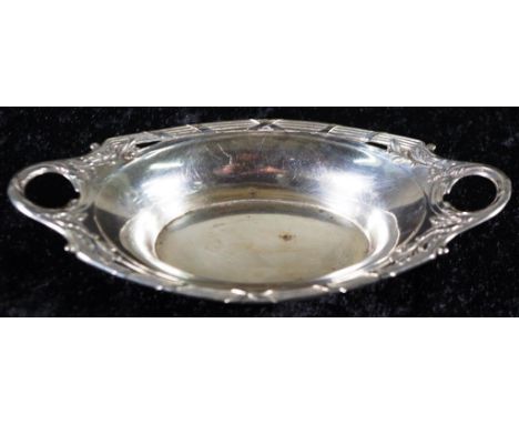 Vintage German silver sweetmeat dish marked 800, WTB, embossed pierced decoration to border, dual handles. (Diameter 15cm app