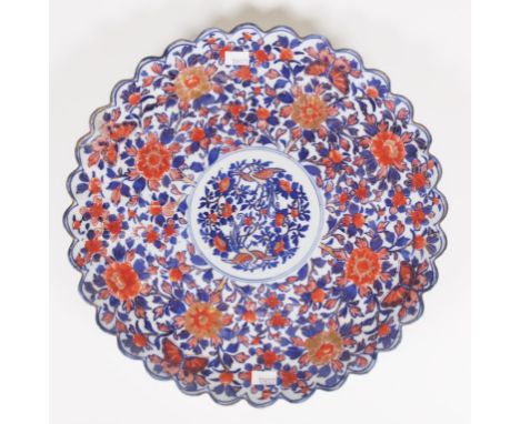 Vintage Japanese Imari charger blue and red traditional decoration, gilt highlights, scalloped rim. (Diameter 31cm approx).