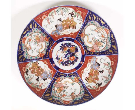 Vintage Japanese Imari charger sectional decoration of figures, and blossoms, with blossom decoration to centre. (Diameter 45