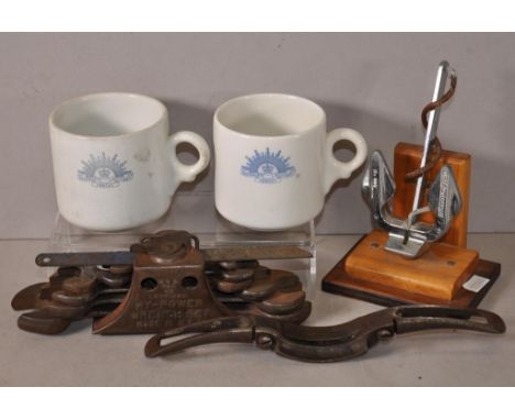 Two AIF Australian Army tea cups, a model ships anchor, and old tools