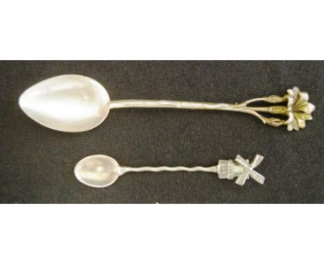 Two various continental silver spoons including Danish coffee spoon, rose finial decoration, marked 835; together with a Dutc