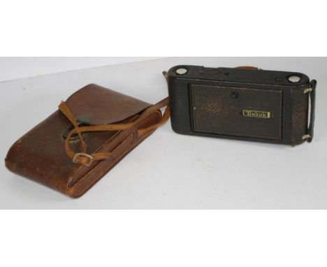 Vintage Eastman Kodak Autographic camera marked 'No 1 A  Autographic Kodak Jr,' including leather carry case.
