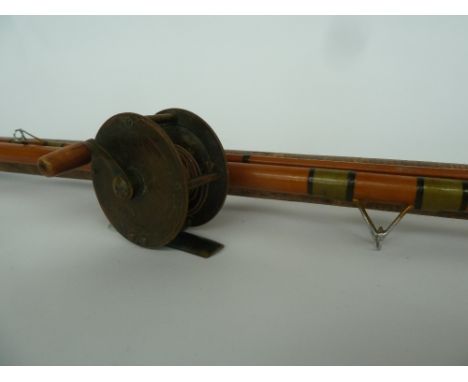 A vintage 12ft bamboo float road with 21” cork handle with sliding alloy reel rings together with a small Victorian brass 2" 