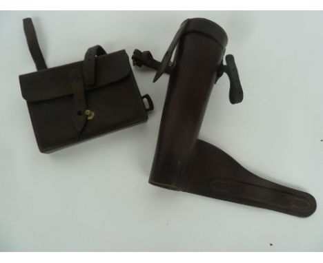 A leather saddle flask holder for saddle mounting 24cm high together with a leather sandwich box holder with saddle straps (2