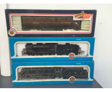 A Bachmann 00 Gauge Loco 14934 LMS in black, a Bachman 00 Gauge 50ft parcel van Crimson LMS in original box, an Airfix 00 Gau