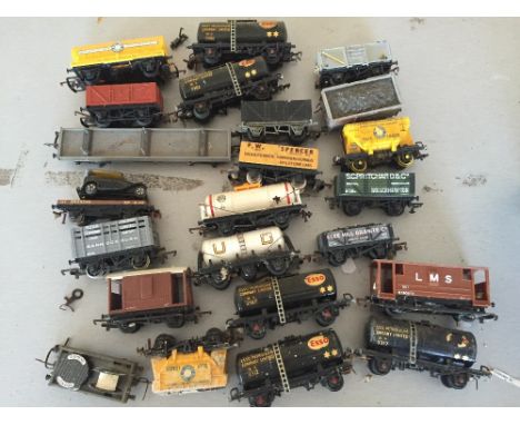 A quantity of mainly Tri-ang  and Hornby railways `00` gauge railway items including 9 planks wagons, 7 planks wagons , Esso 