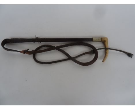 A hunting whip engraved with metal collar WVE 50cmL with leather plaited thong and lash