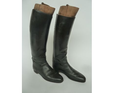 A pair of Lobbs ladies black hunting boots with wooden trees, boots widened at rear, one with a zip, size 6 - 6.5
