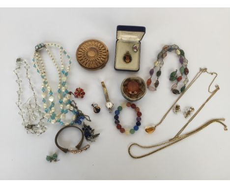 A selection of costume jewellery including necklaces, earrings, brooches, a Sekonda ladies watch and a Stratton powder compac