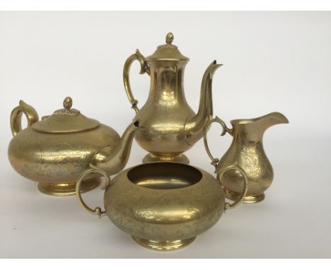A Victorian E.P.N.S compressed baluster four piece tea and coffee service, comprising teapot, coffee pot, milk jug and sugar 