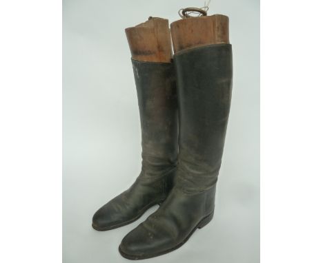 A pair of Lobbs black ladies hunting boots with garter straps, size 6, with wooden trees