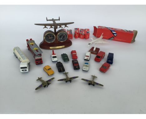 A number of boxed and unboxed die-cast Corgis including Land Rover, Mini and others together with Matchbox Spitfire and Conco