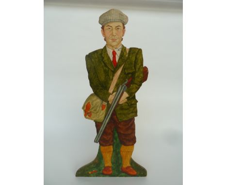 A Mandy Learmonth stick and umbrella stand in the form of a man dressed for shooting with cartridge bag, holding shotgun 80cm