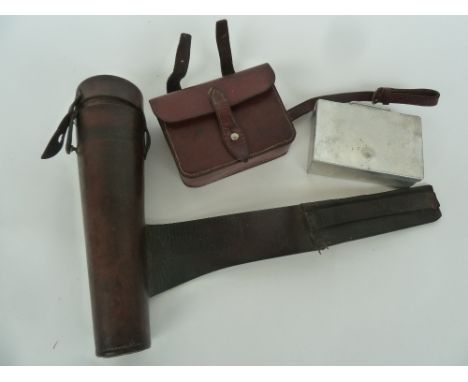 A metal sandwich box with leather case and sadlle straps together with a leather saddle flask holder (2)