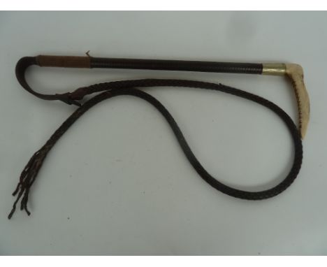 A ladies hunting whip 50cmL made by Swaine and engraved CVE with leather thong