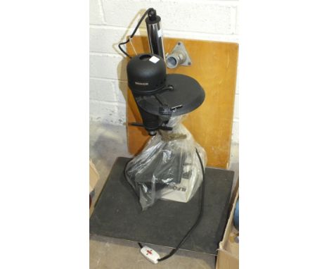 A quantity of darkroom equipment, tripods and a Minox enlarger with instructions.