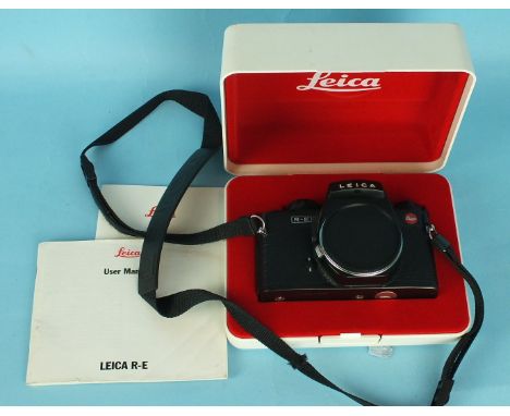 A Leica R-E camera body no.1755351 with instruction manual, in white plastic case.
