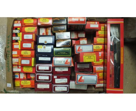 A quantity of boxed 00 gauge rolling stock by Hornby, Bachmann, Lima, Dapol, Mainline and Replica, (57 approximately, boxes c