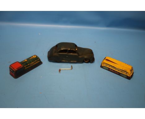 A 1950S CHAD VALLEY WIND UP WONDER CAR with key together with a vintage tin plate coach and train