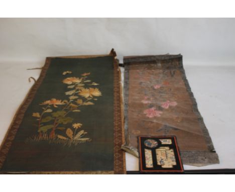 AN ORIENTAL SCROLL WITH EMBROIDERED DECORATION OF FLOWERS AND BUTTERFLIES, together with a painted example of flowers and a s