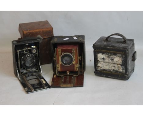 A SANDERSONS PATENT FOLDING CAMERA A/F,  together with two other folding cameras