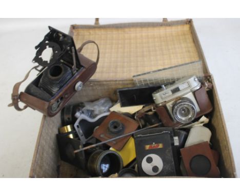 A SMALL CASE OF ASSORTED PHOTOGRAPHIC LENSES ETC.  including a Halina Rolls Camera  A/F