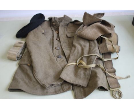 A BRITISH ARMY OTHER RANKS KHAKI TUNIC, with KSLI badges and general service buttons, along with cap and various items of web