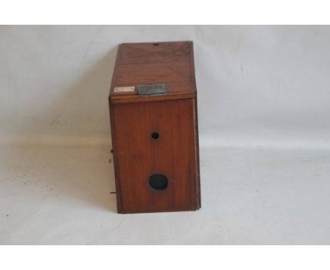 A FALLOWFIELDS FACILE DETECTIVE STYLE CAMERA IN MAHOGANY CASE